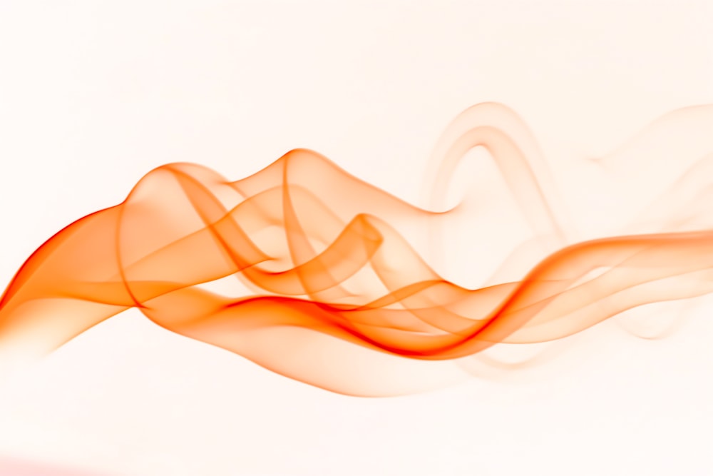 a white background with a red and orange smoke