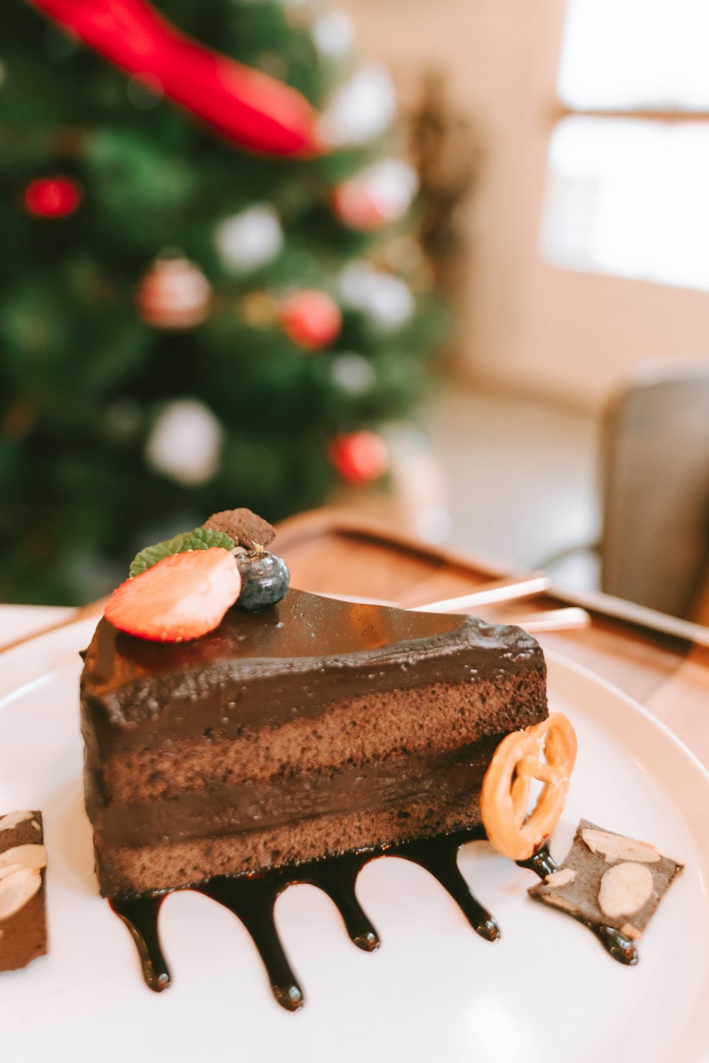 a piece of chocolate cake on a white plate