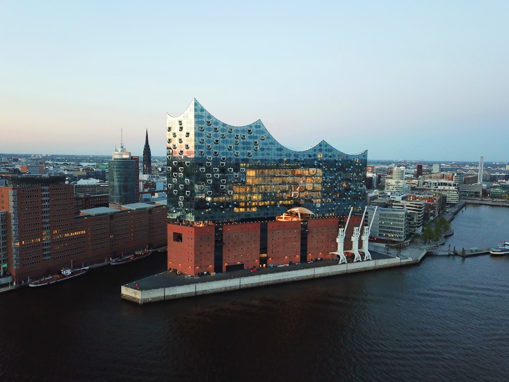 an aerial view of a city and a body of water