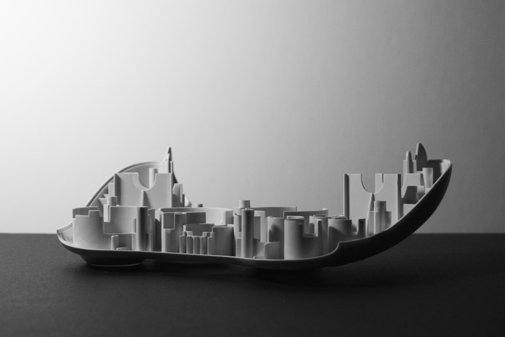 a black and white photo of a model of a city