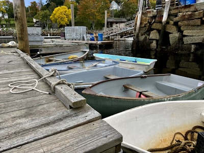 A collection of durable boating accessories neatly arranged on a wooden dock.