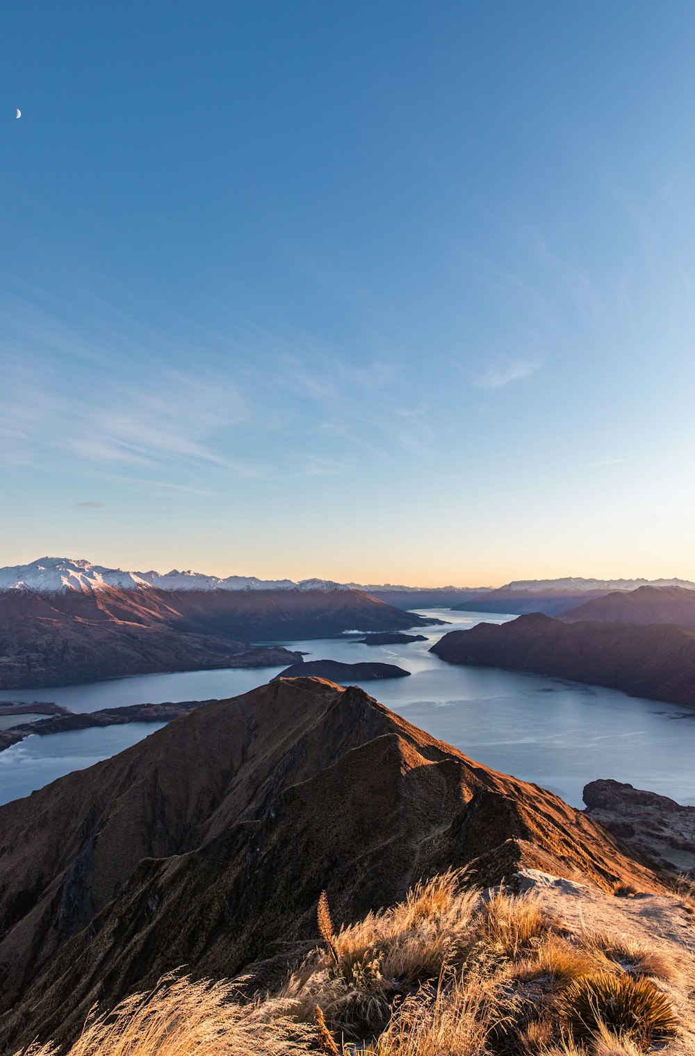 a view of a lake from the top of a mountain