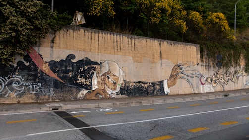 A vibrant street mural mocking political promises with exaggerated characters.