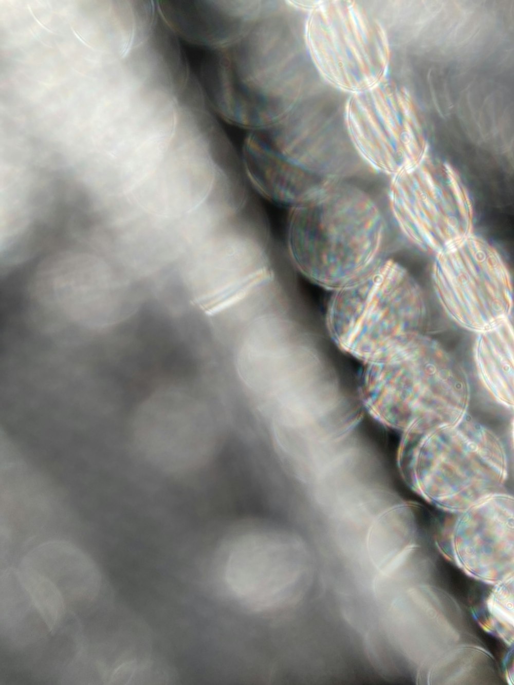 a close up of a metal object with a blurry background