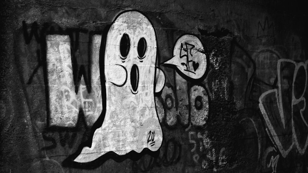a black and white photo of a ghost on a wall