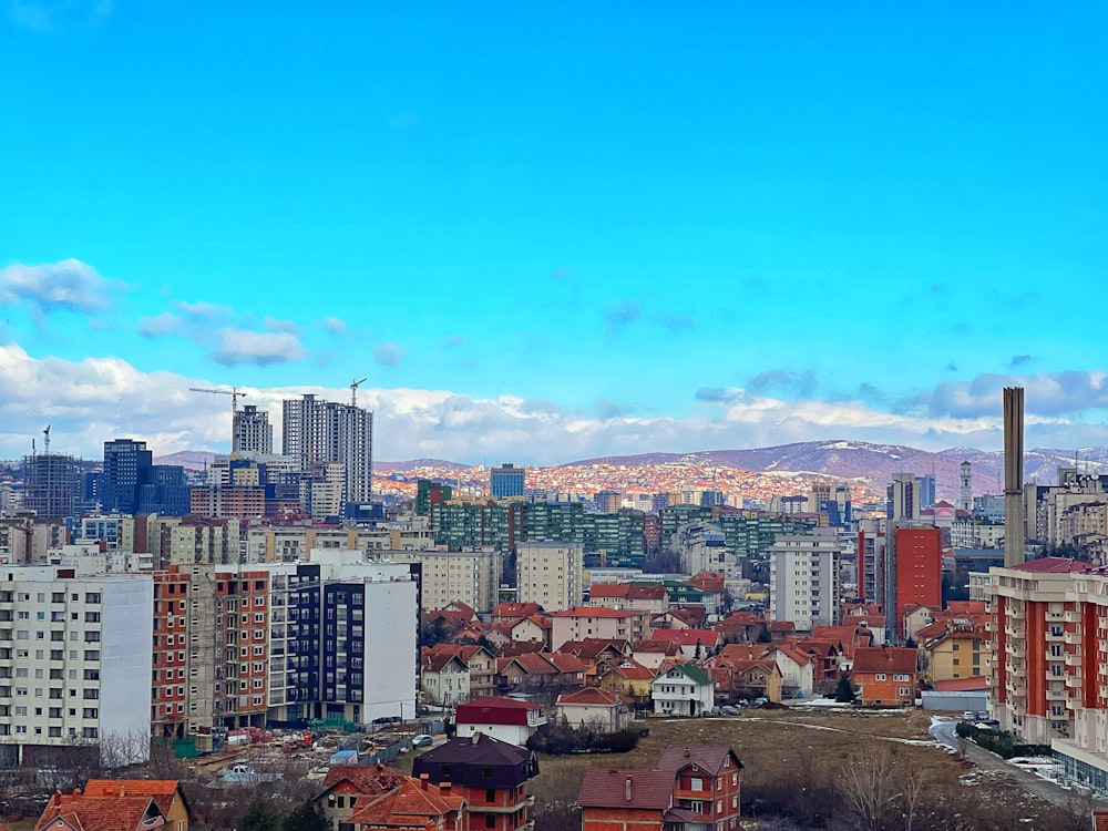 a view of a city with tall buildings