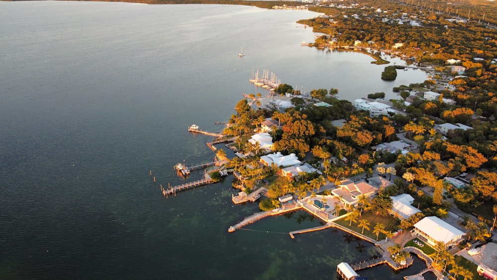 a bird's eye view of a small town on the water