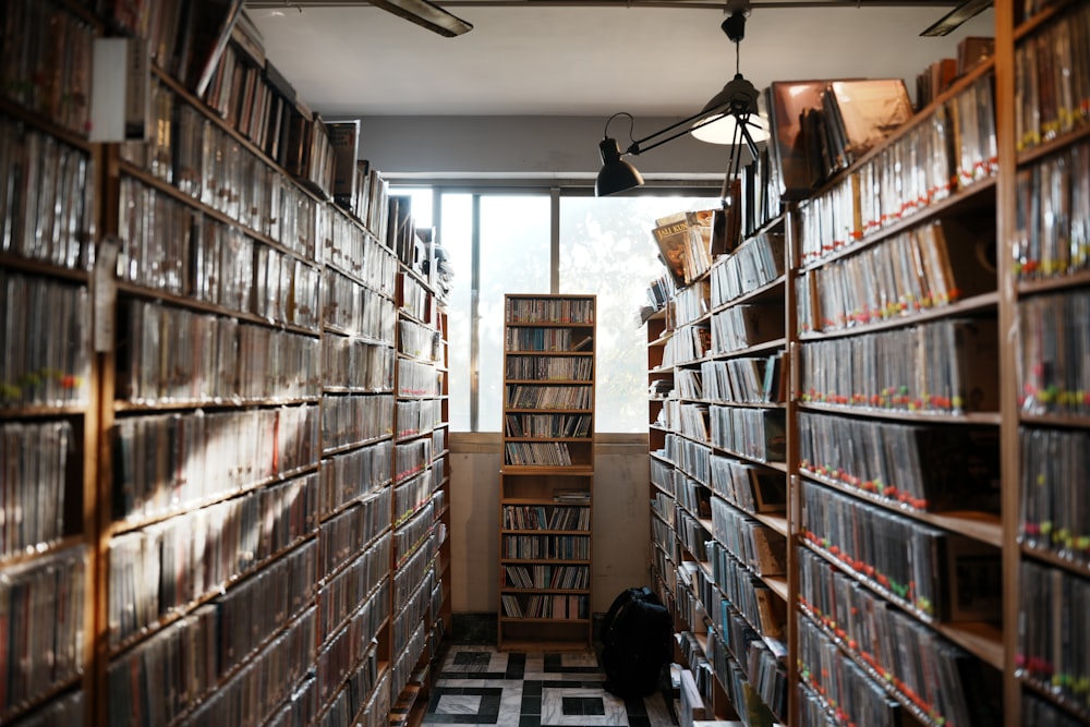 a room filled with lots of shelves filled with cds
