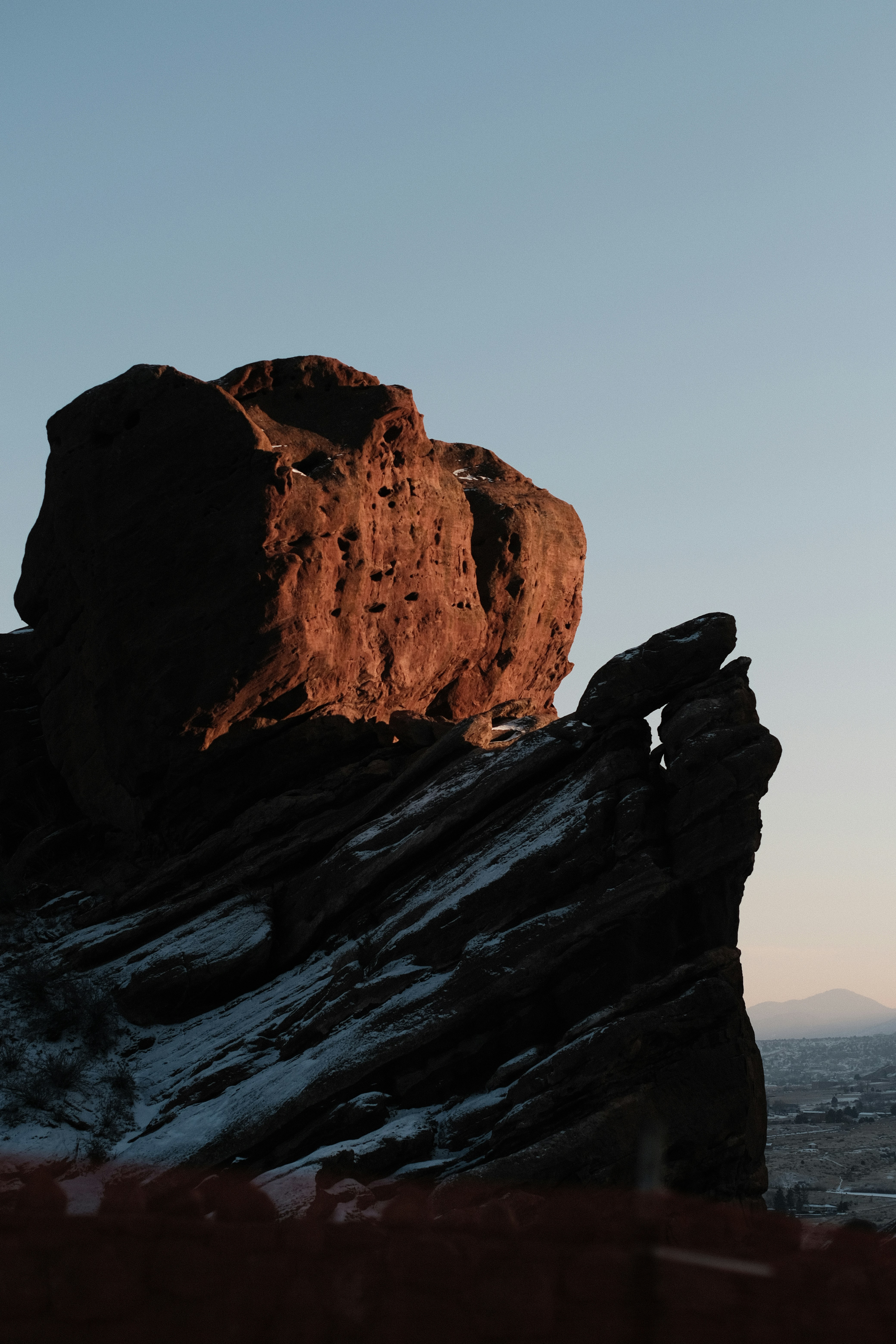 a rock formation in the middle of a desert