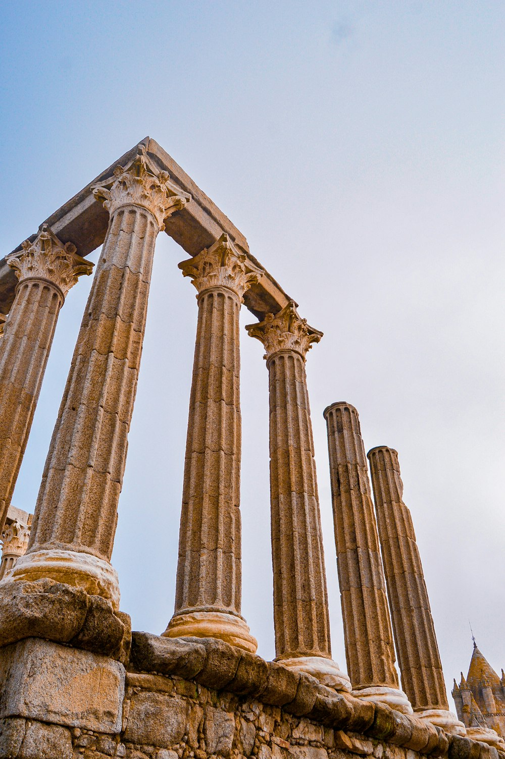 a group of stone pillars sitting next to each other