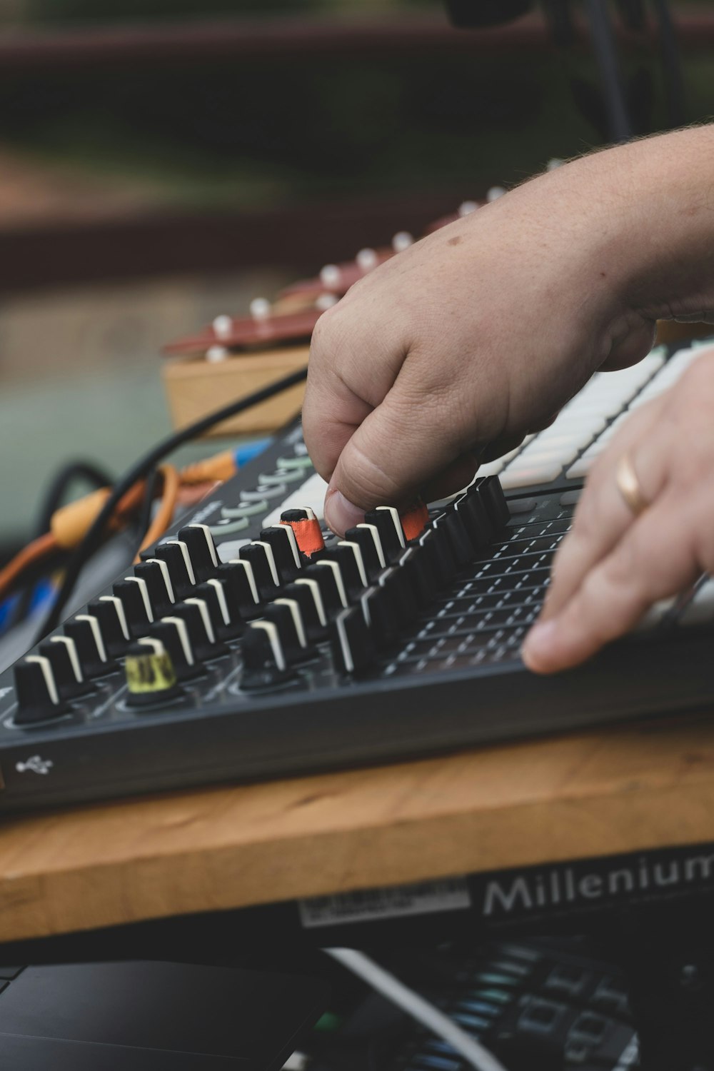 a close up of a person playing a musical instrument