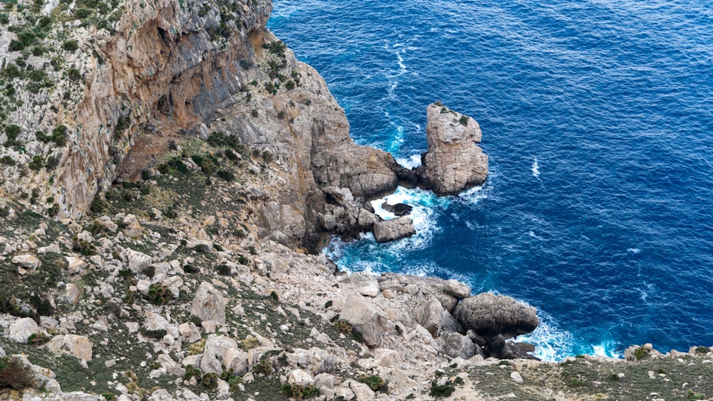 a view of the ocean from the top of a mountain