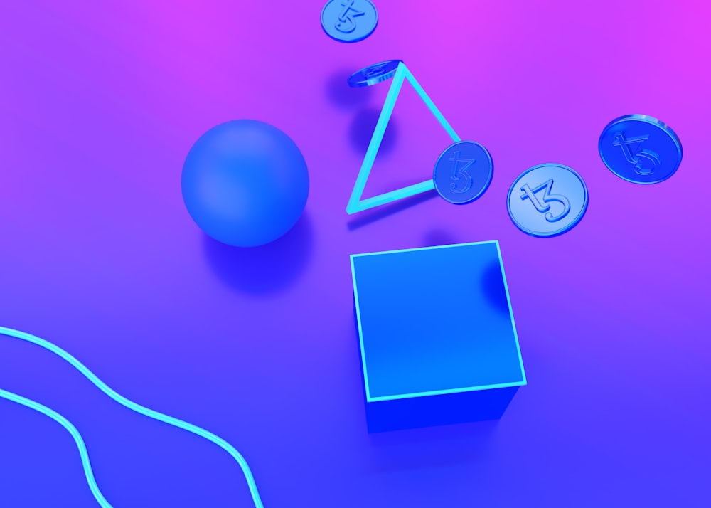 a blue box sitting on top of a purple table