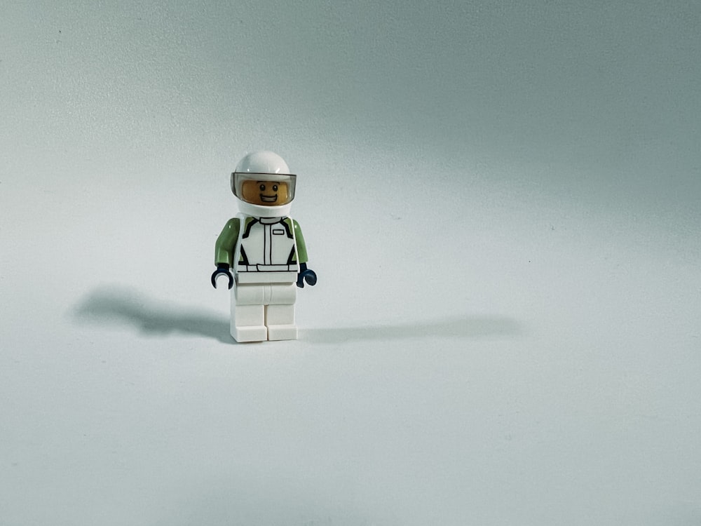 a lego man in a space suit and helmet