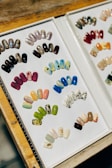 a couple of pictures of different colored nails