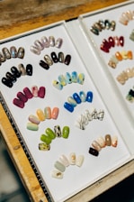 a couple of pictures of different colored nails