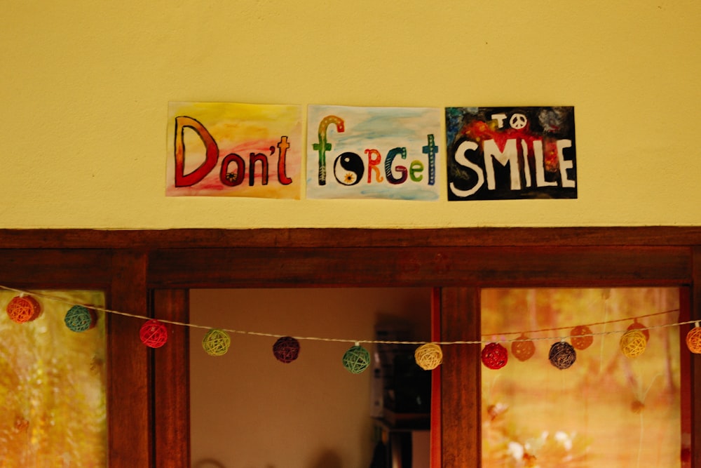 a door with a sign that says don't forget to smile