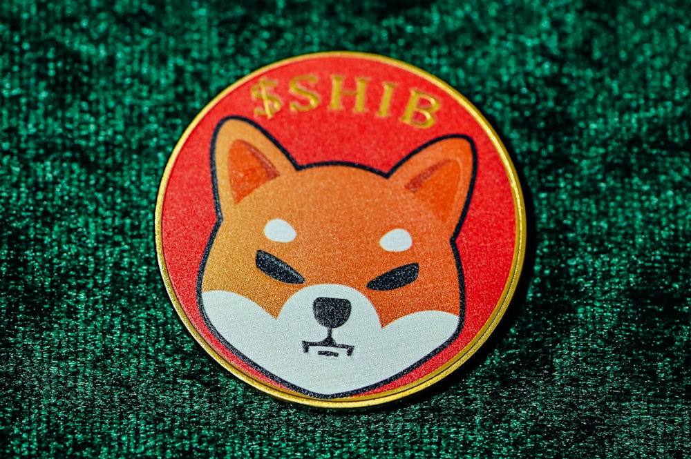 a badge with a picture of a fox on it