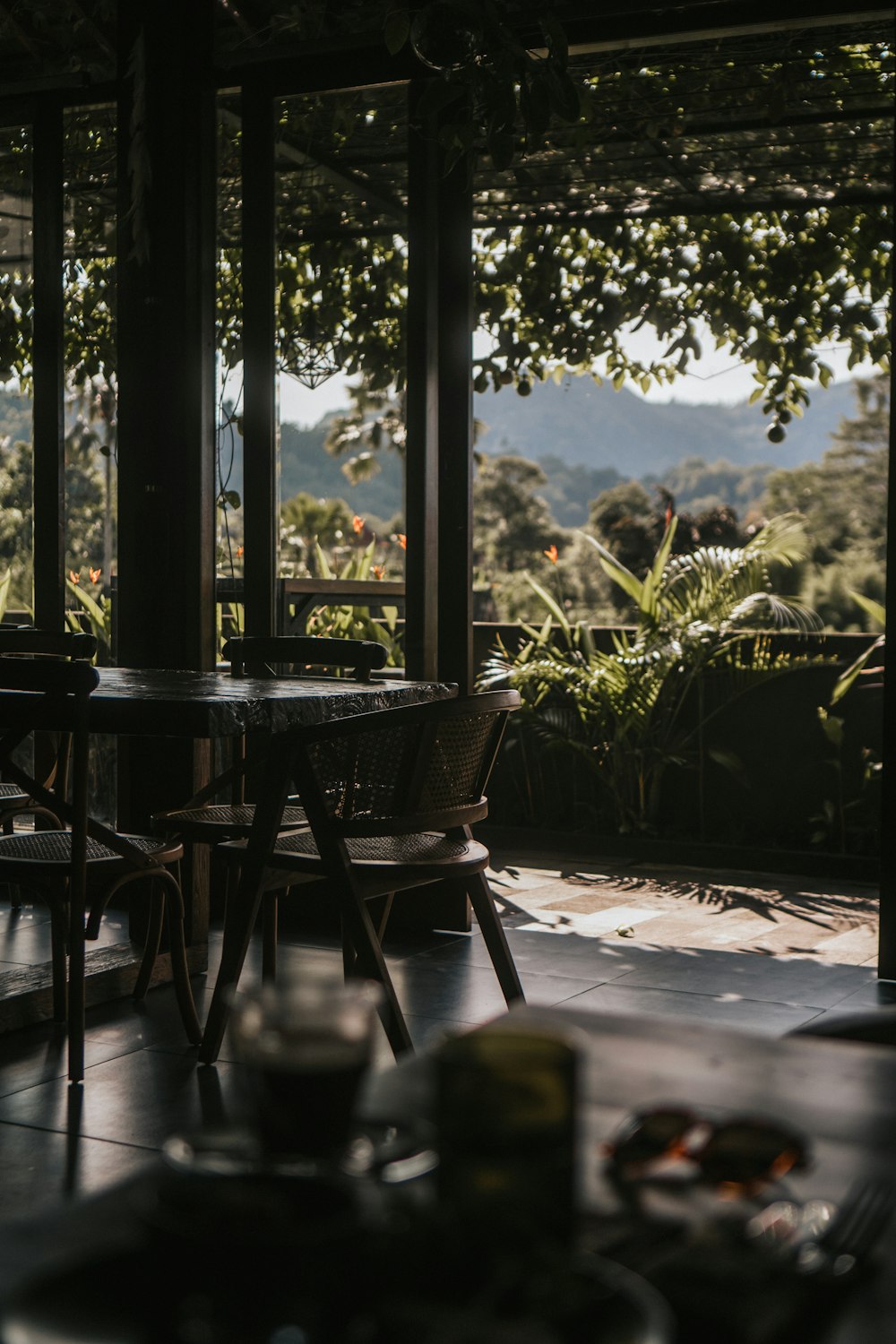 a table and chairs in a room with a view