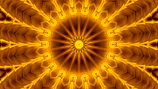 Detailed shot of golden dots forming a radiant mandala pattern on a dark green background.