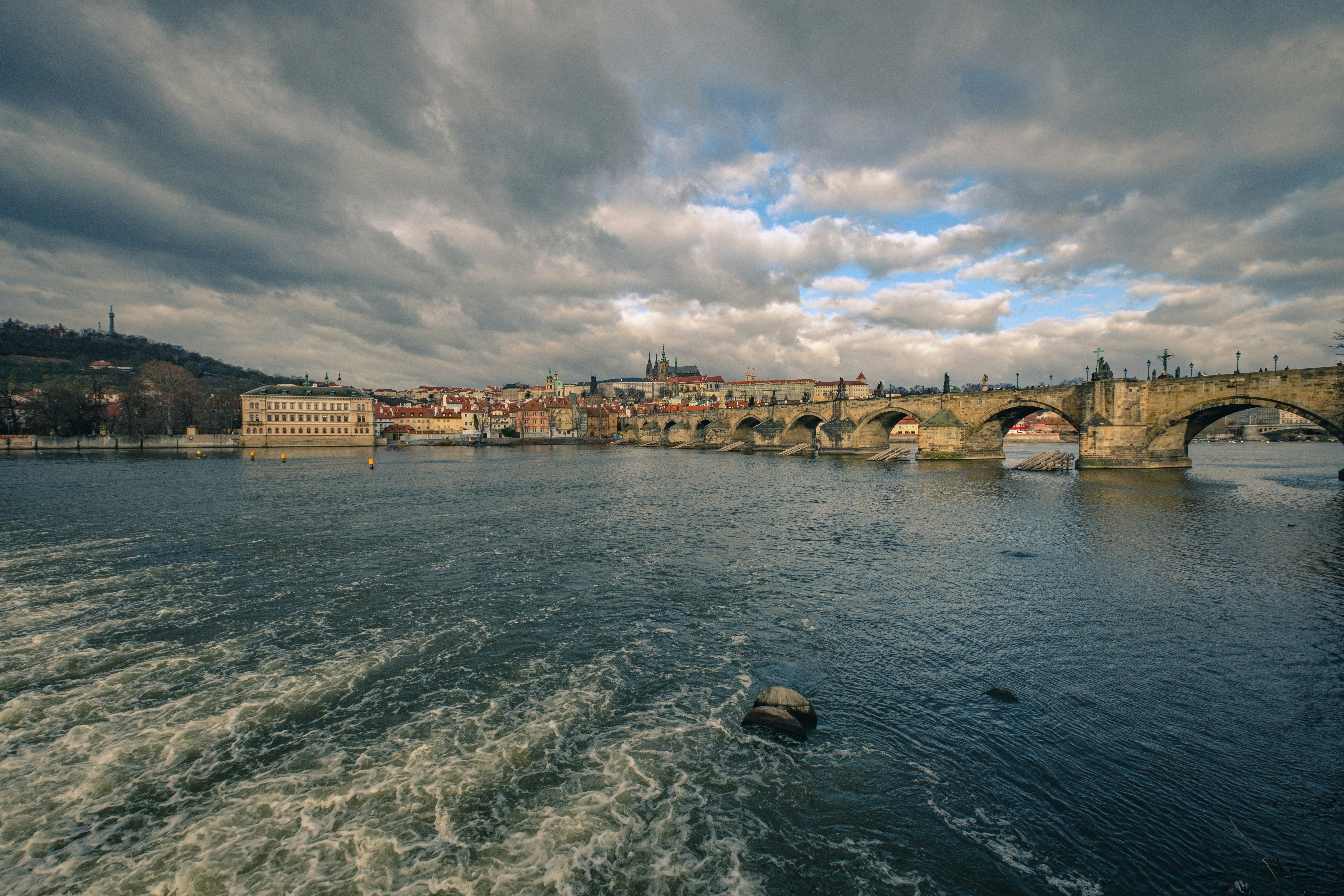 a view of a bridge over a body of water
