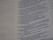 A close-up of a page from a text document with printed text in two columns, mainly on the right half of the page. The text is formatted in a question and answer style.