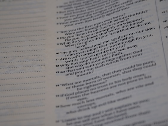 A close-up of a page from a text document with printed text in two columns, mainly on the right half of the page. The text is formatted in a question and answer style.