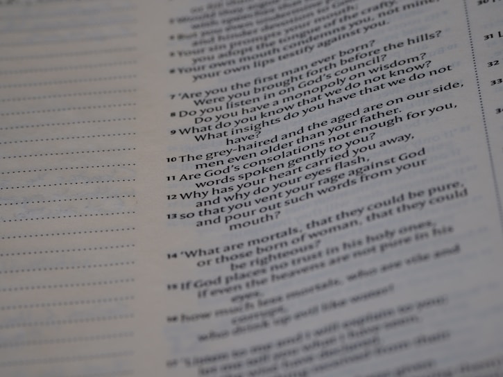 A close-up of a page from a text document with printed text in two columns, mainly on the right half of the page. The text is formatted in a question and answer style.