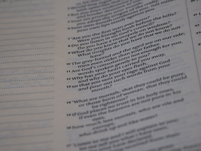 A close-up of a page from a text document with printed text in two columns, mainly on the right half of the page. The text is formatted in a question and answer style.
