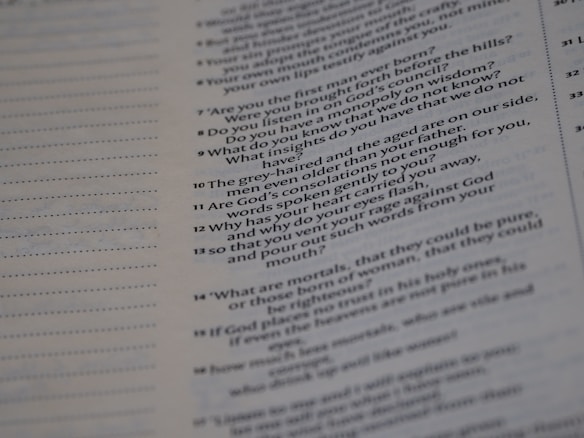 A close-up of a page from a text document with printed text in two columns, mainly on the right half of the page. The text is formatted in a question and answer style.