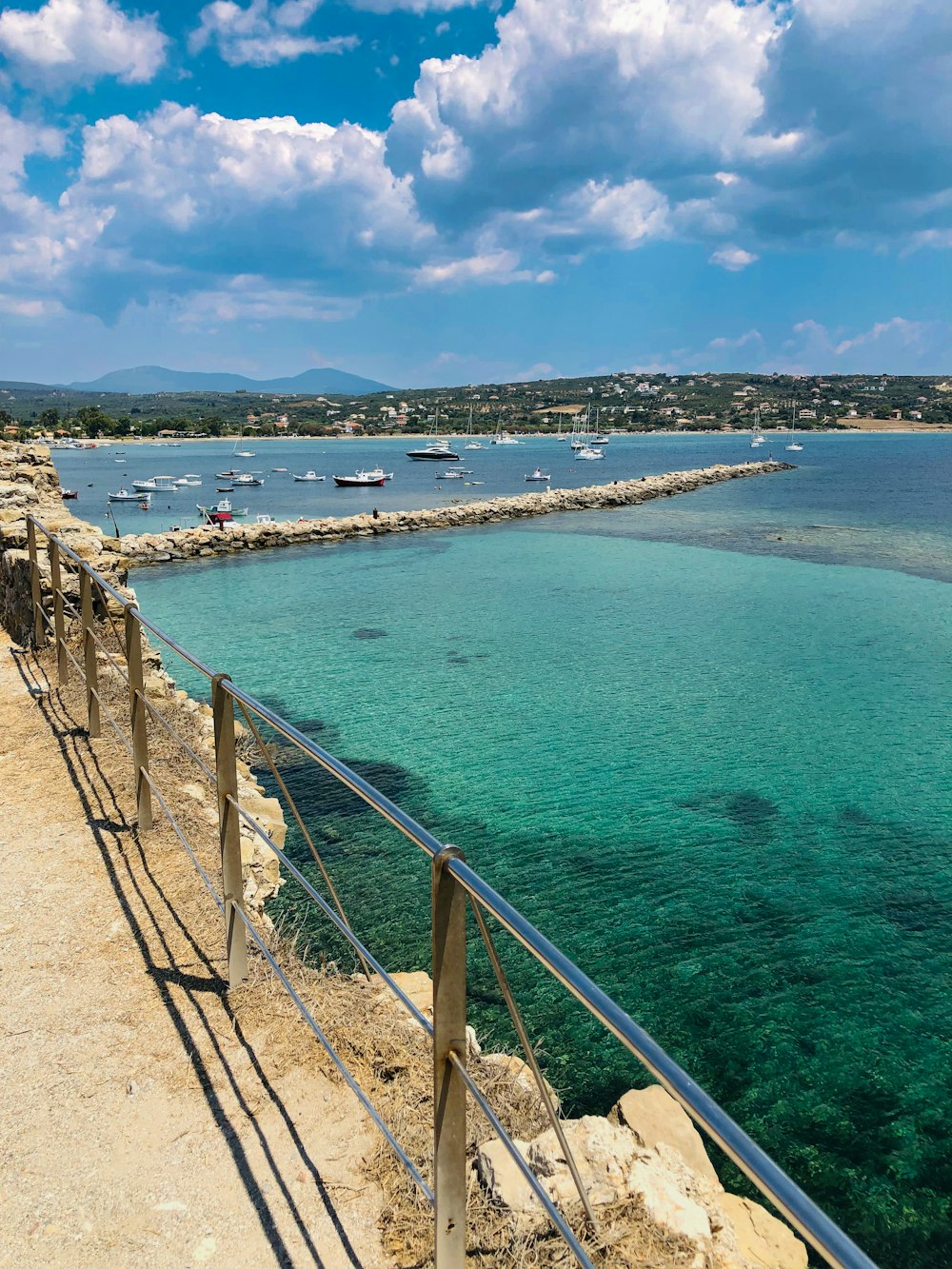 a view of a body of water from a bridge