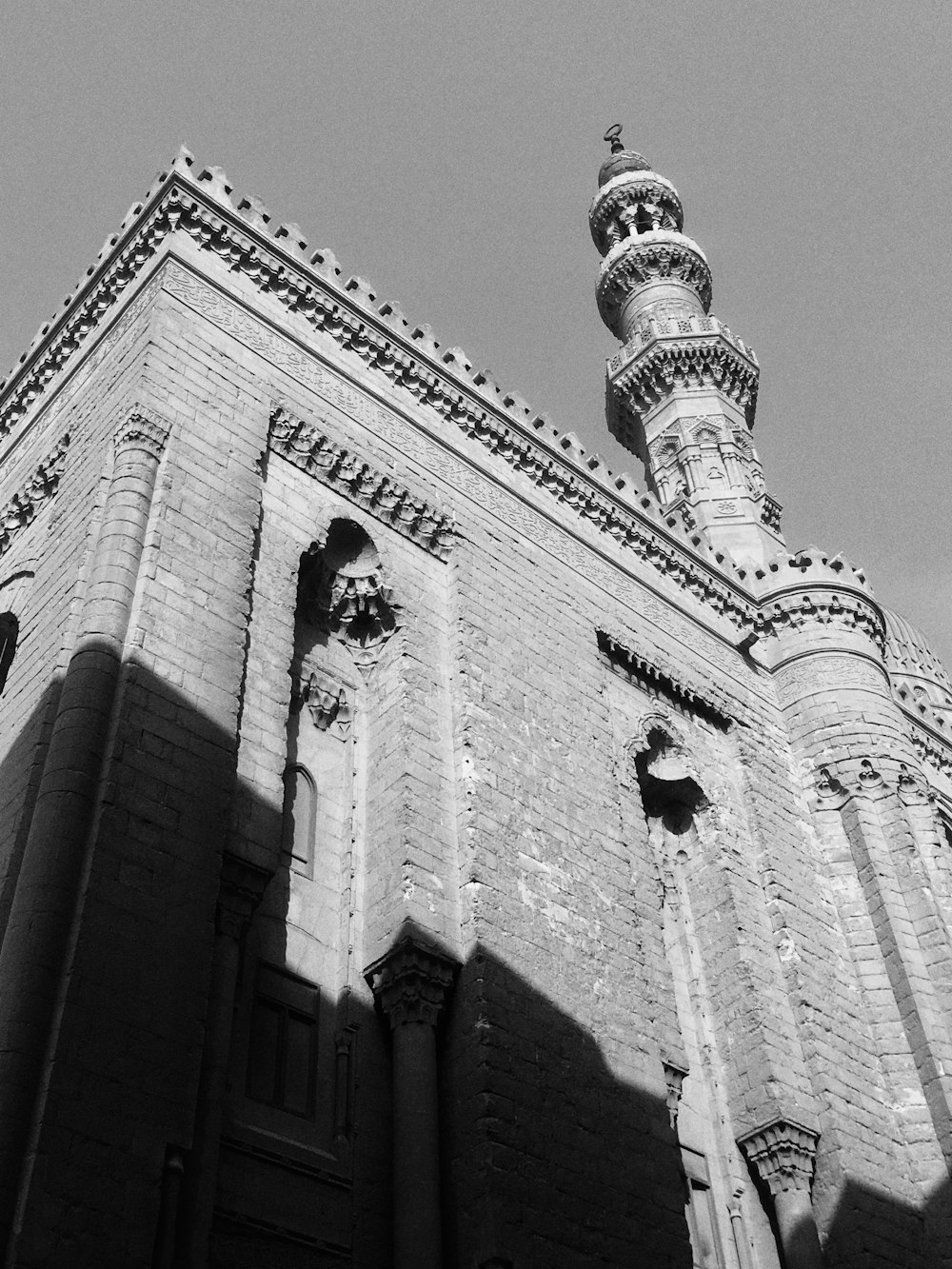 a black and white photo of a tall building