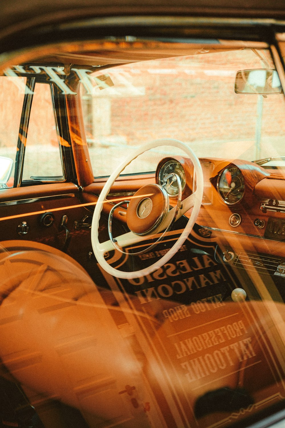 the interior of a car with a steering wheel