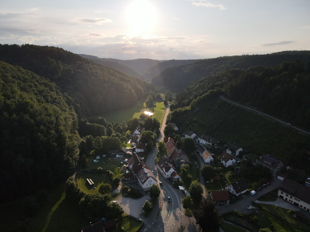 an aerial view of a village in the mountains