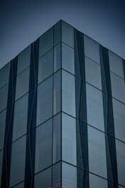 a tall building with a clock on the side of it