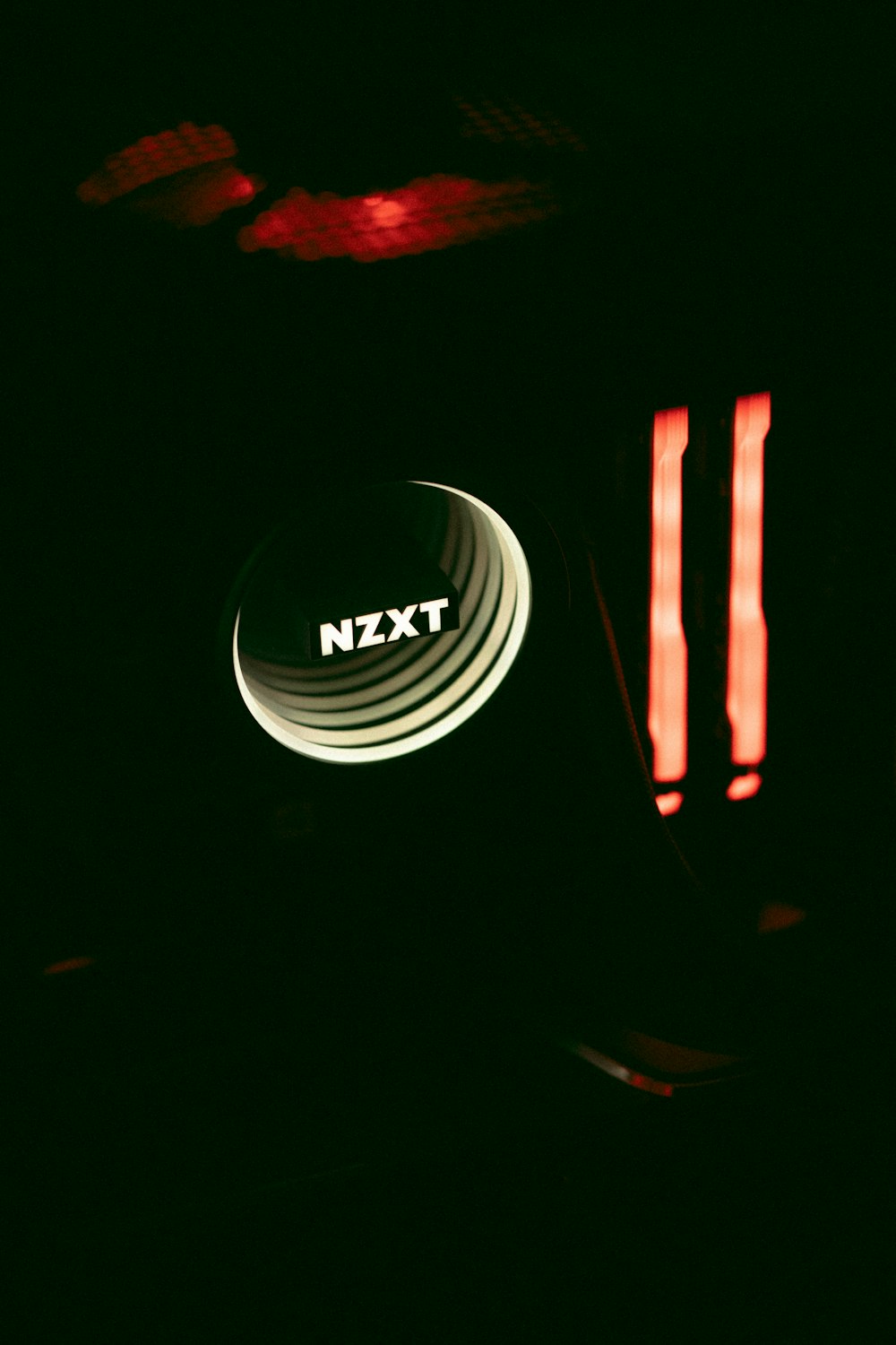 a close up of a button on a car in the dark