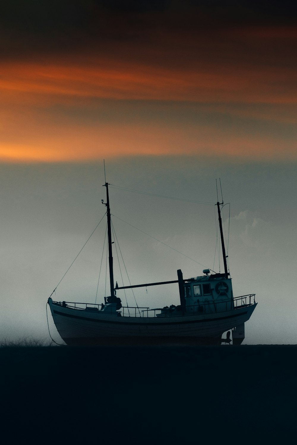 a small boat in a large body of water