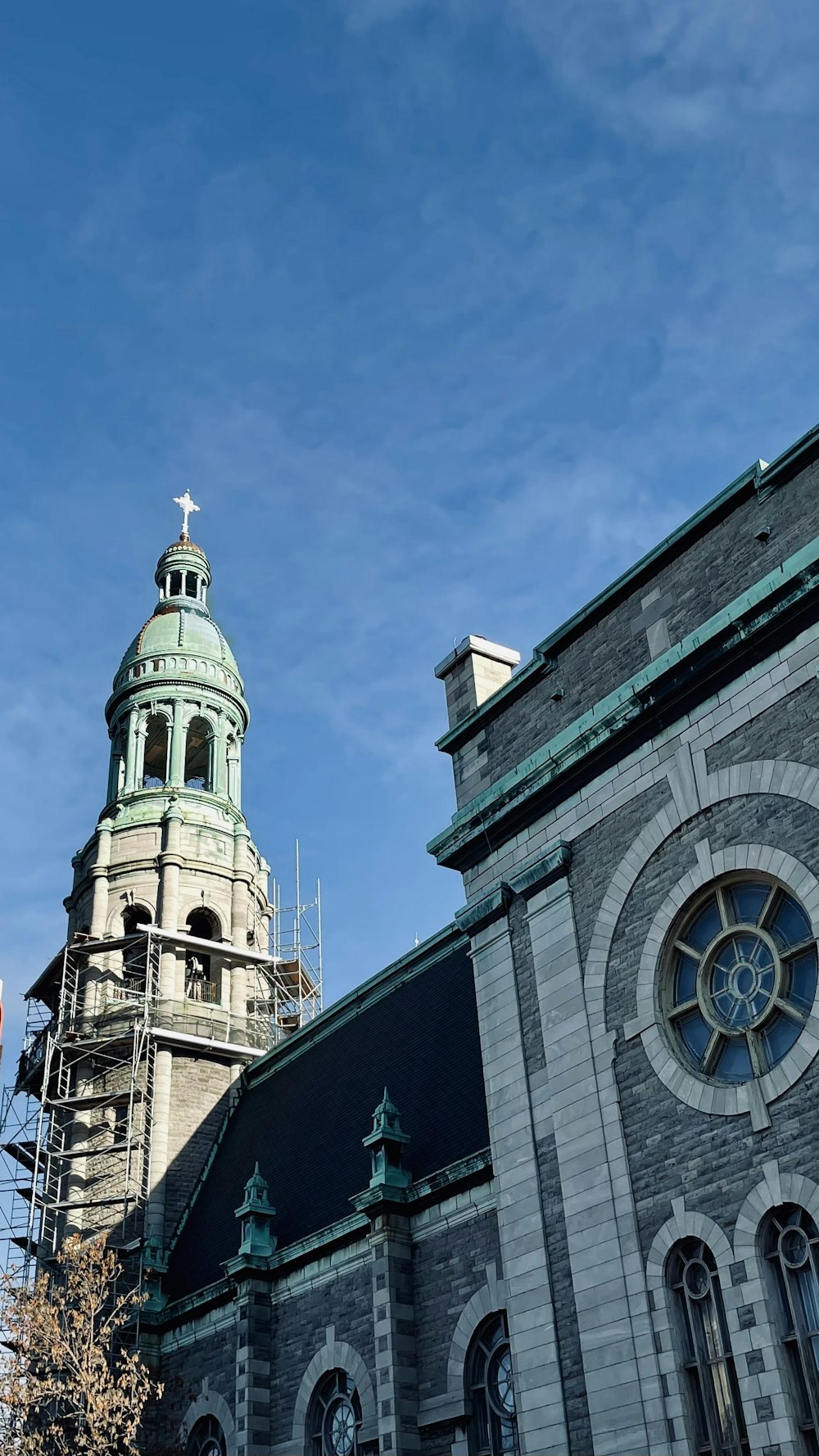 a church with a steeple and a clock tower