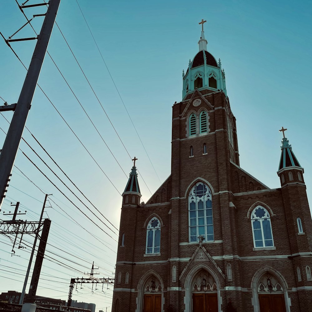 an old church with a steeple and two towers