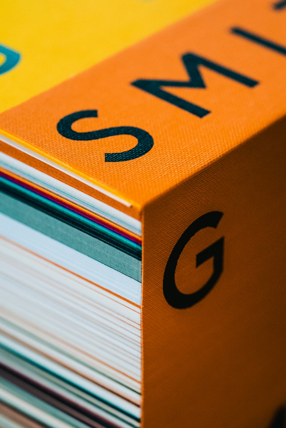 a stack of books with the word g on them