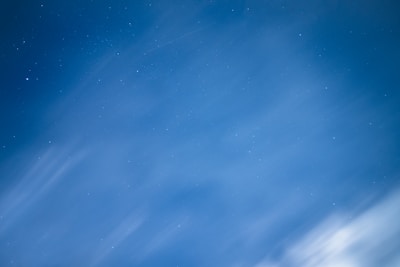 A serene night sky with deep blue and golden stars reflecting the minimalistic European style.