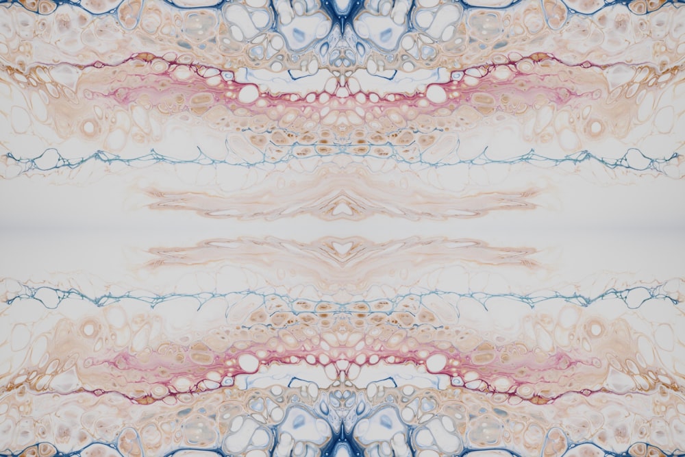 a picture of an abstract pattern with a blue, pink, and white background