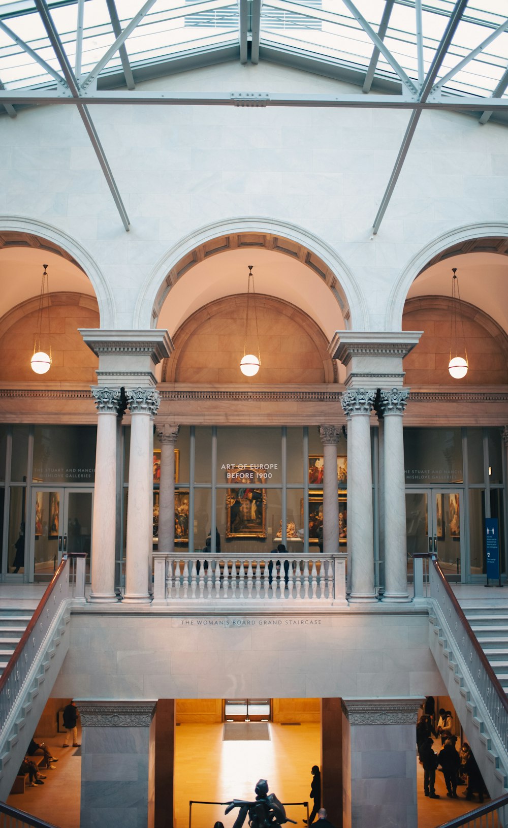 a couple of people that are standing in a building