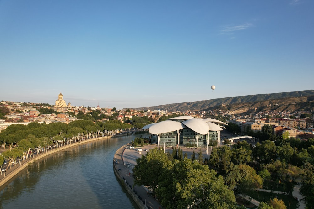 an aerial view of a river and a city