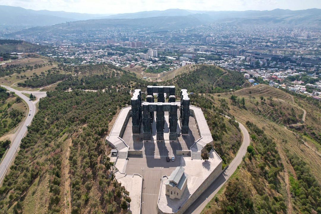 an aerial view of a monument in the middle of a valley,