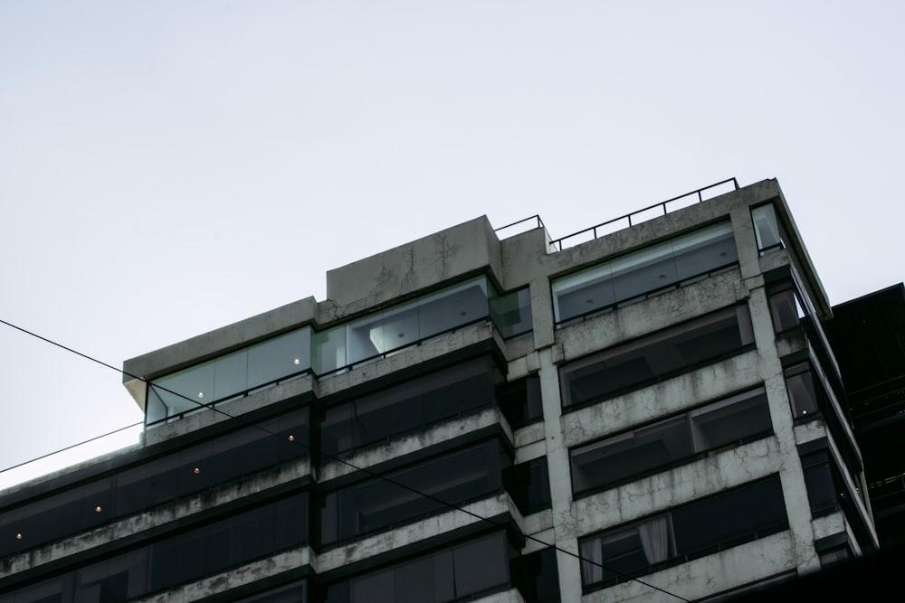 a tall building with lots of windows on top of it