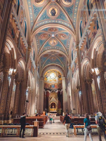 A group of visitors exploring the stunning architecture of Santuario de Las Lajas.