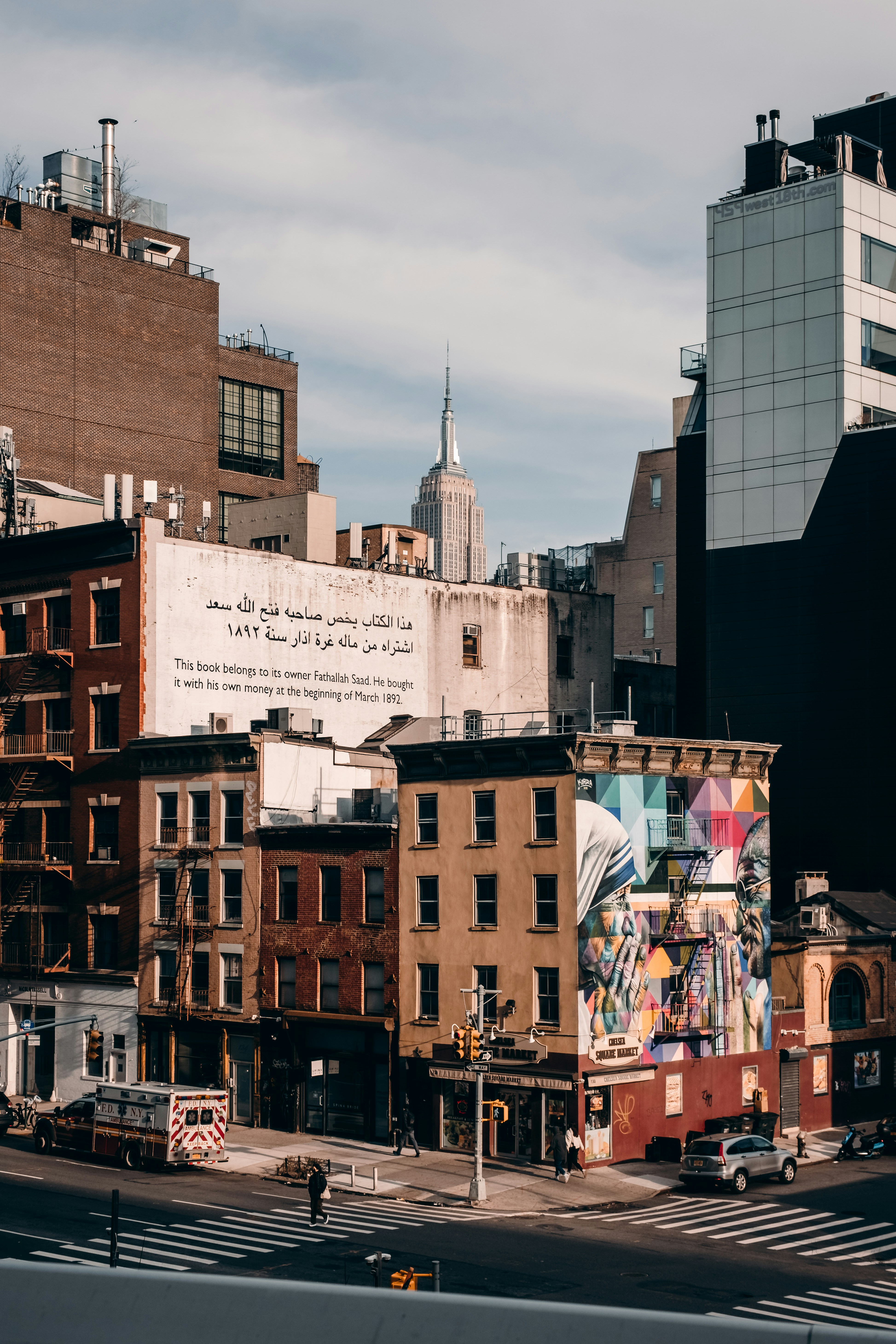 a city street filled with lots of tall buildings