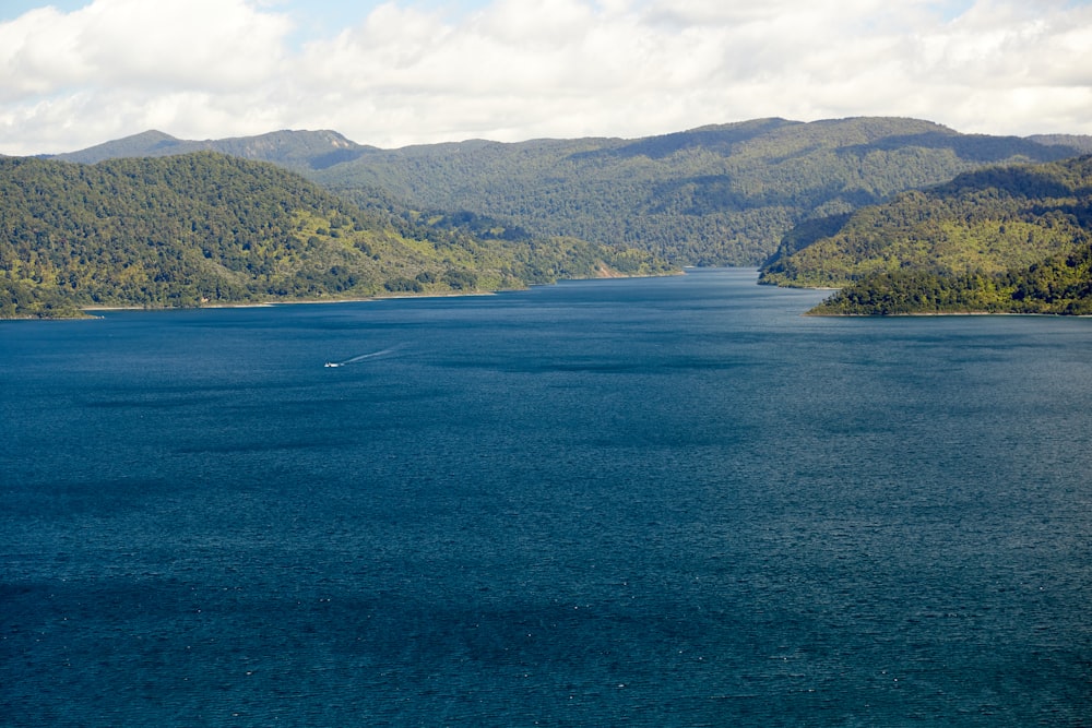 a large body of water surrounded by mountains