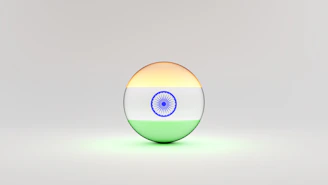 Close-up of the Bolta Samvidhan device playing the Indian Constitution audio with saffron, white, and green background.